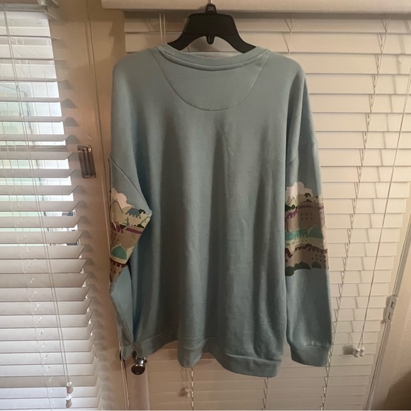 Studio Ghibli/Kiki’s Delivery Service Skyline Scenic Crew Long-Sleeve (NWT) - Picture 6 of 9